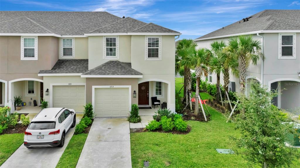 5715 Archipelago Street Nokomis, FL 34275 - Photo 44 of 52 a front view of a house with a yard