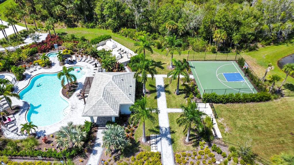 5715 Archipelago Street Nokomis, FL 34275 - Photo 48 of 52 an aerial view of residential house with outdoor space and trees all around