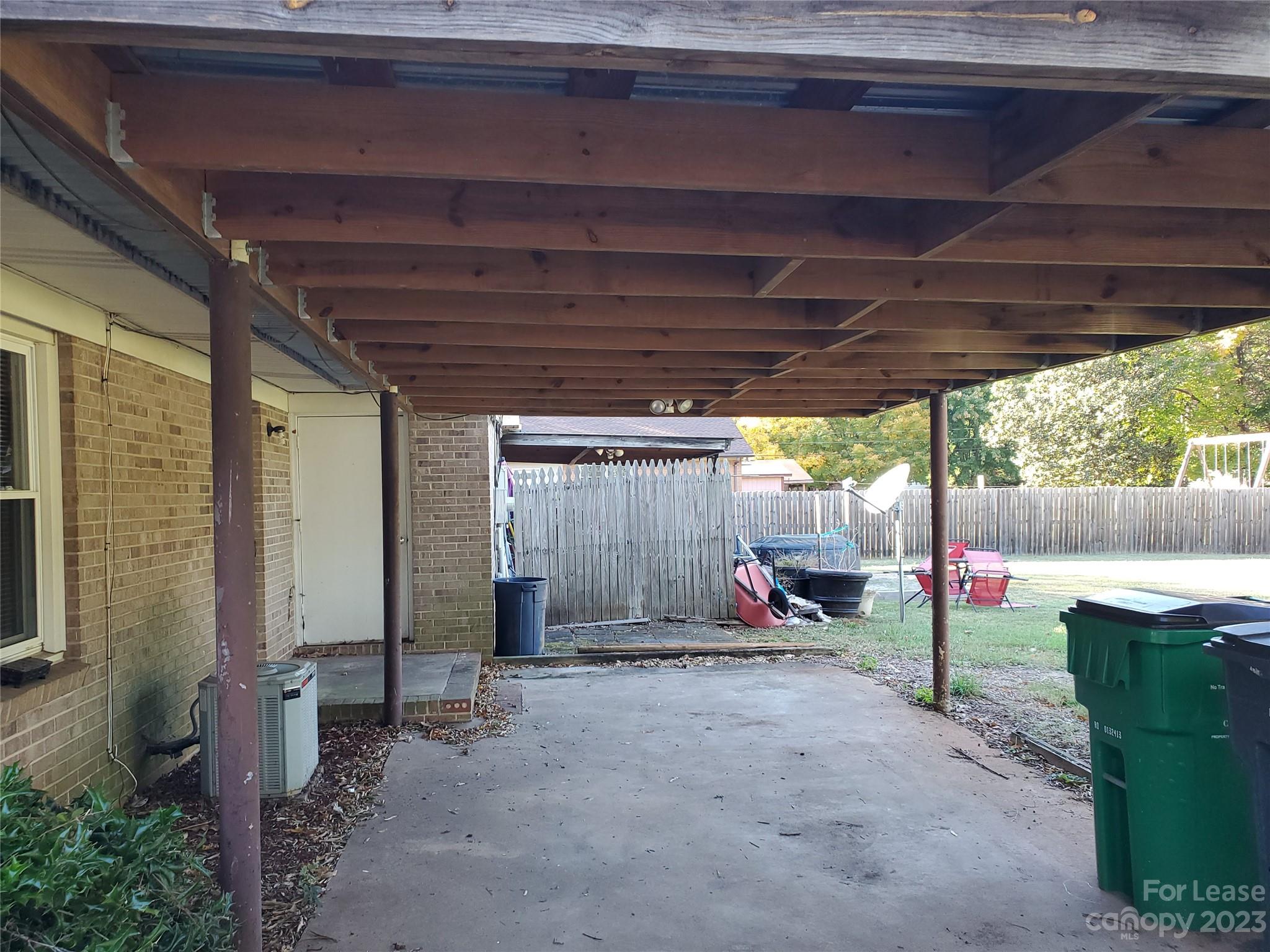 6100 Pleasant Grove Road Charlotte, NC 28216 - Photo 12 of 14 a view of a porch with hardwood