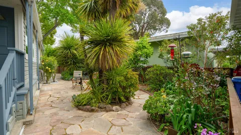 a view of a backyard of a house