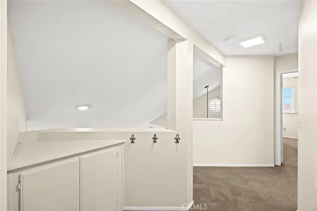 a view of a hallway with closet