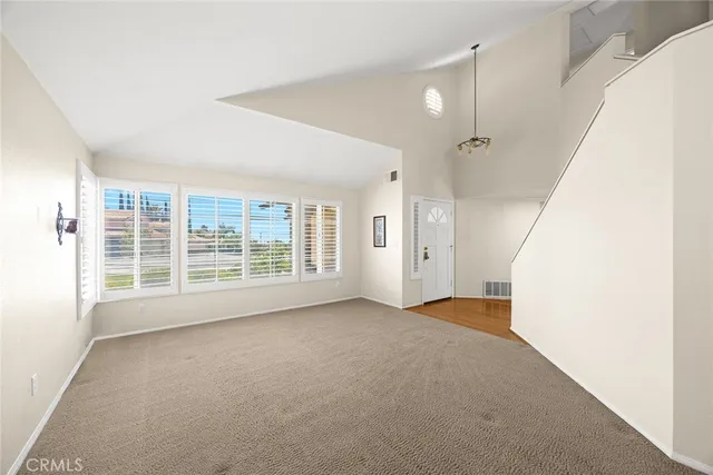 an empty room with windows