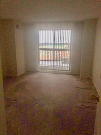 804 Ferncroft Tower, Unit 804 Middleton, MA 01949 - Photo 23 of 33 a view of an empty room with a window