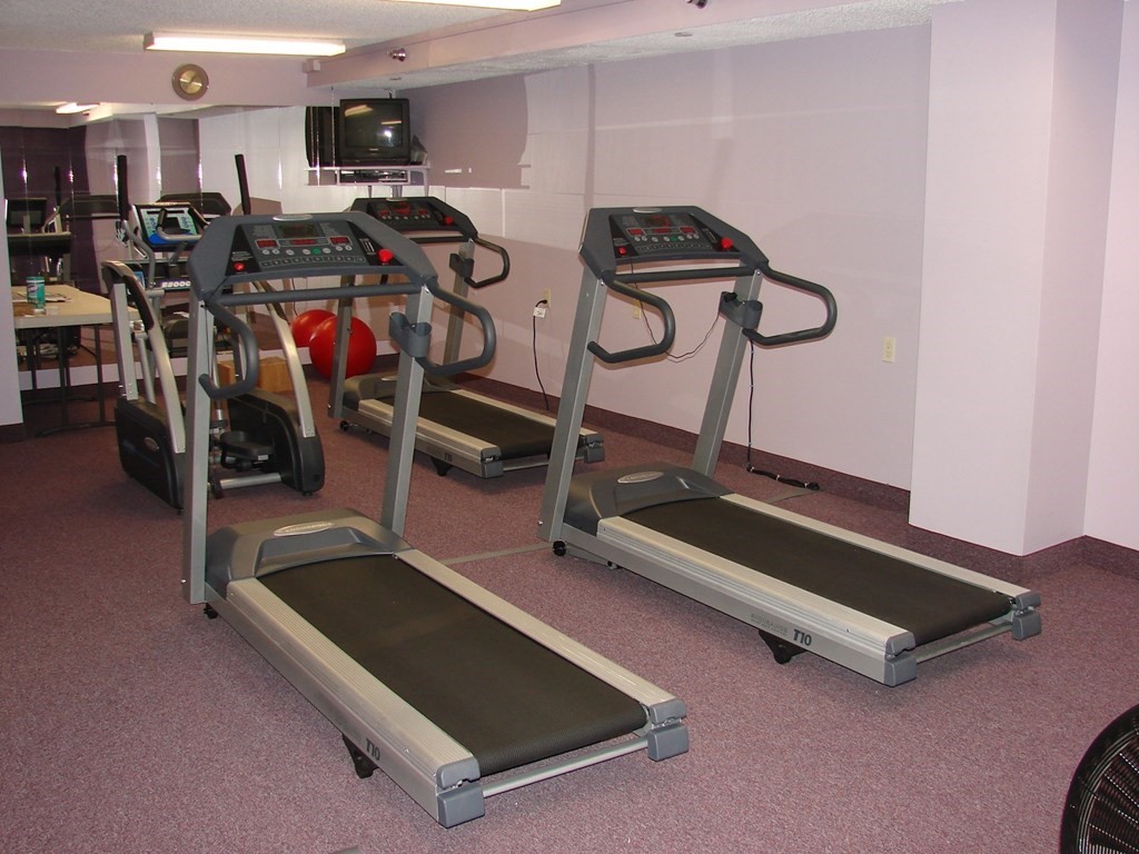 804 Ferncroft Tower, Unit 804 Middleton, MA 01949 - Photo 8 of 33 a view of a room with gym equipment
