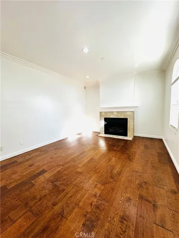 an empty room with a fireplace
