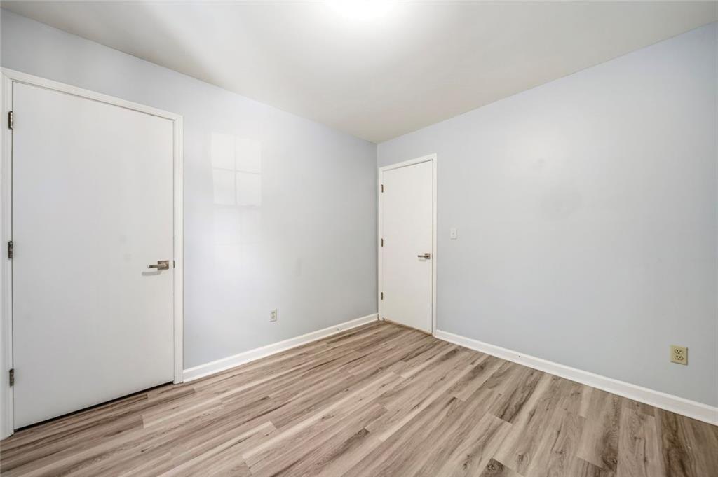 2702 Davenport Road Northwest Duluth, GA 30096 - Photo 16 of 48 a view of room with wooden floor