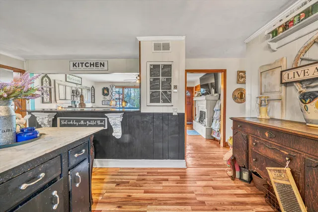 a kitchen with stainless steel appliances granite countertop a stove and a refrigerator
