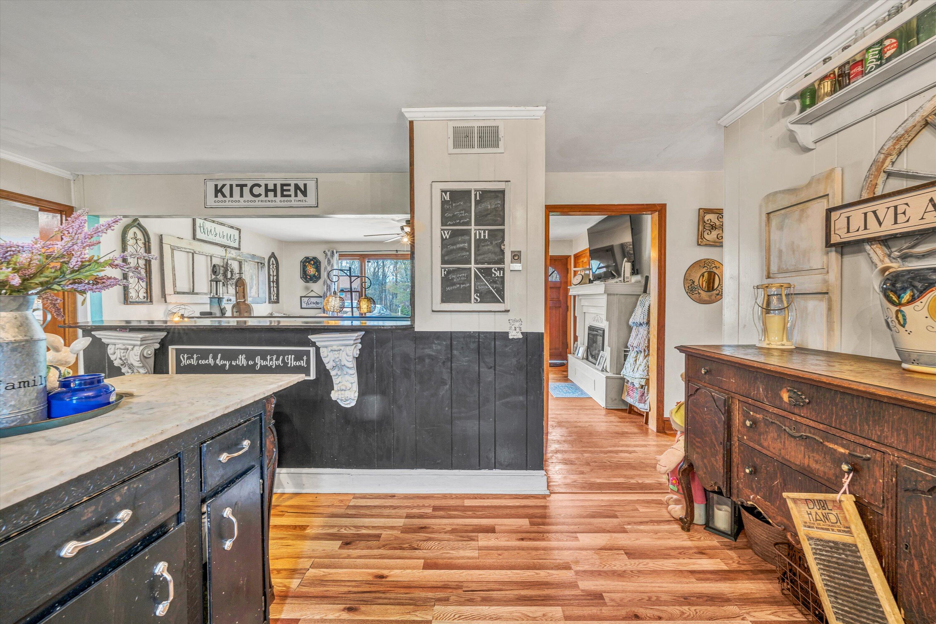 105 Cornell Road Rocky Mount, VA 24151 - Photo 13 of 34 a kitchen with stainless steel appliances granite countertop a stove and a refrigerator