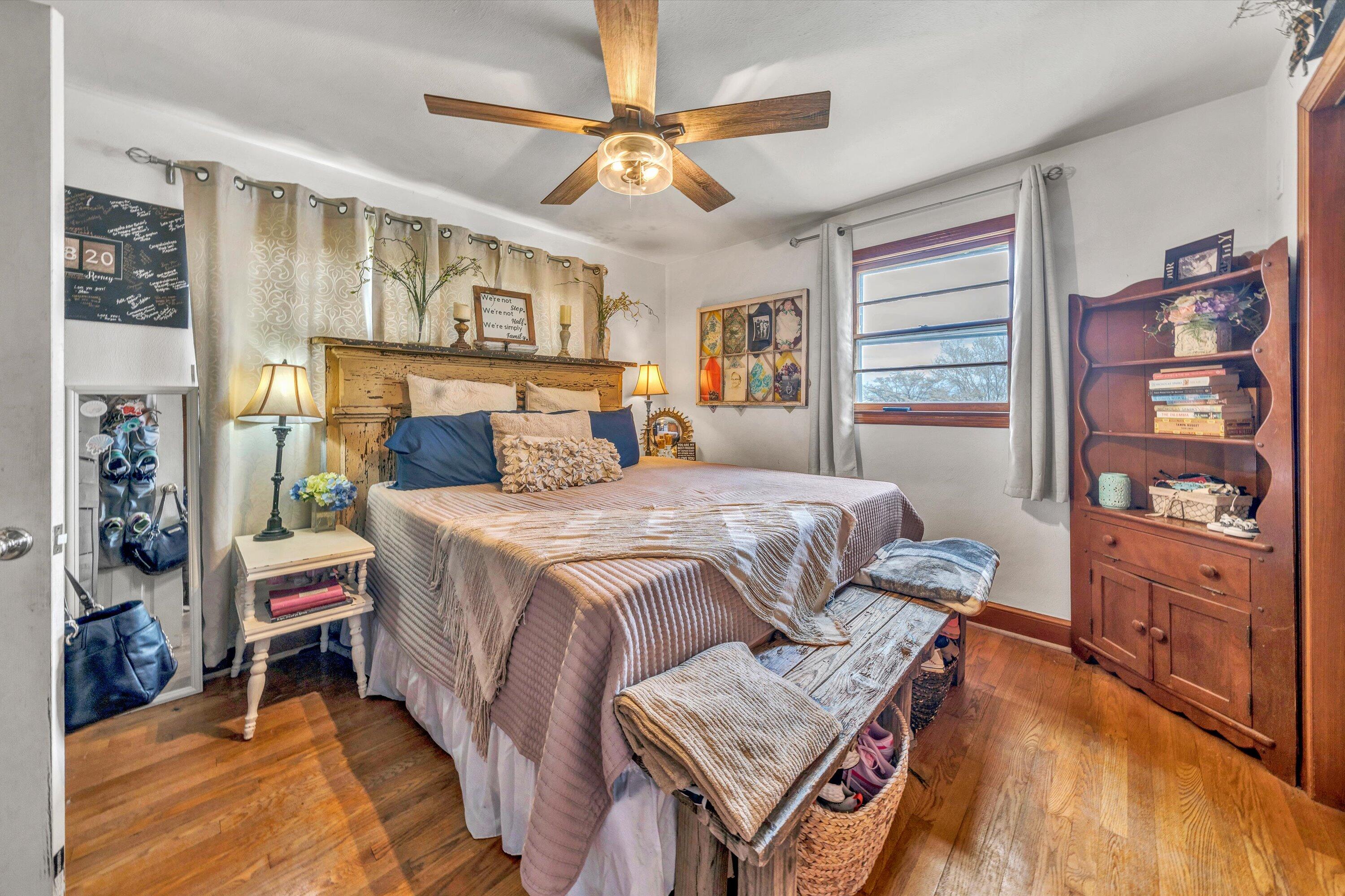 105 Cornell Road Rocky Mount, VA 24151 - Photo 17 of 34 a bed room with a bed and a book shelf