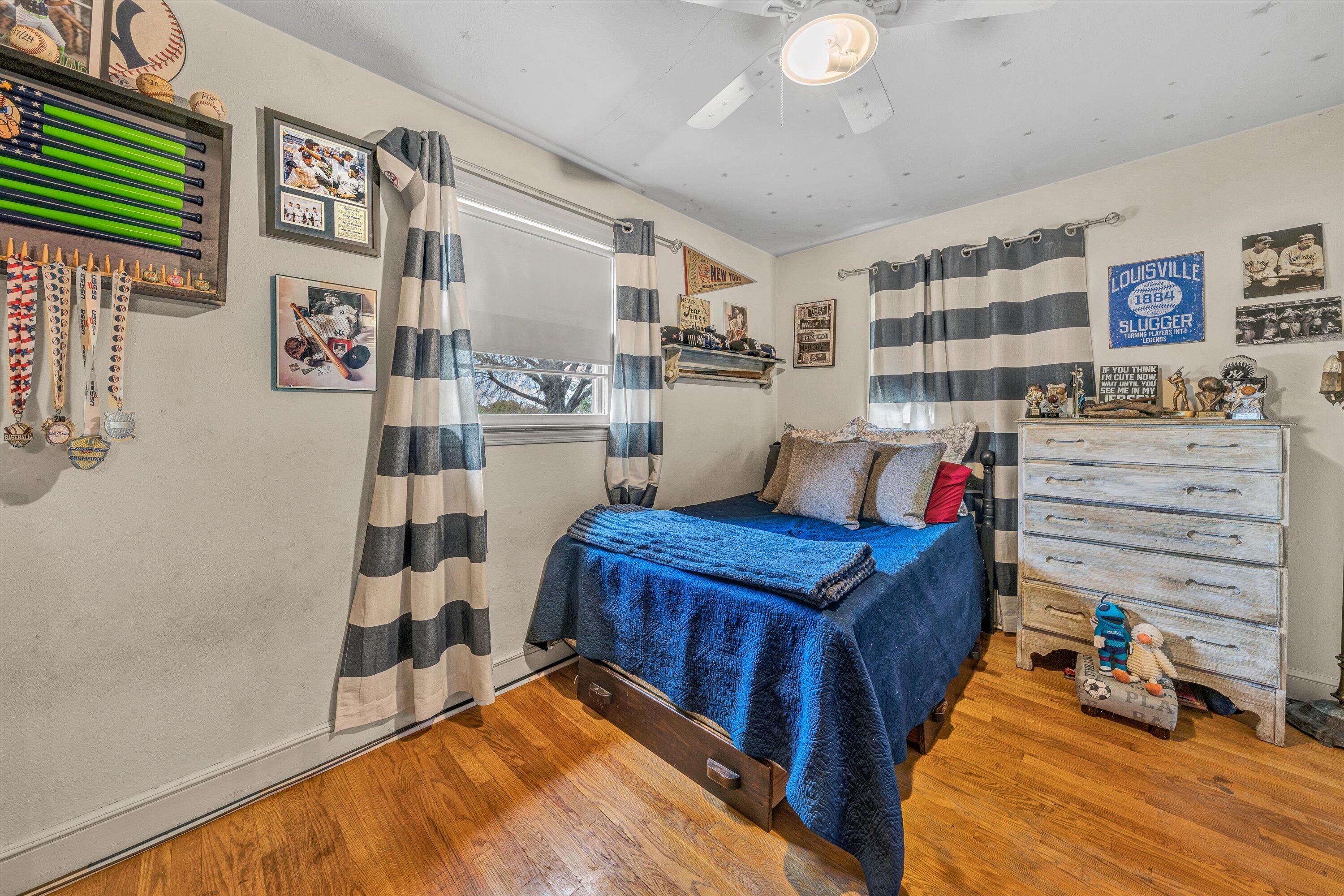 105 Cornell Road Rocky Mount, VA 24151 - Photo 19 of 34 a living room with furniture and a book shelf
