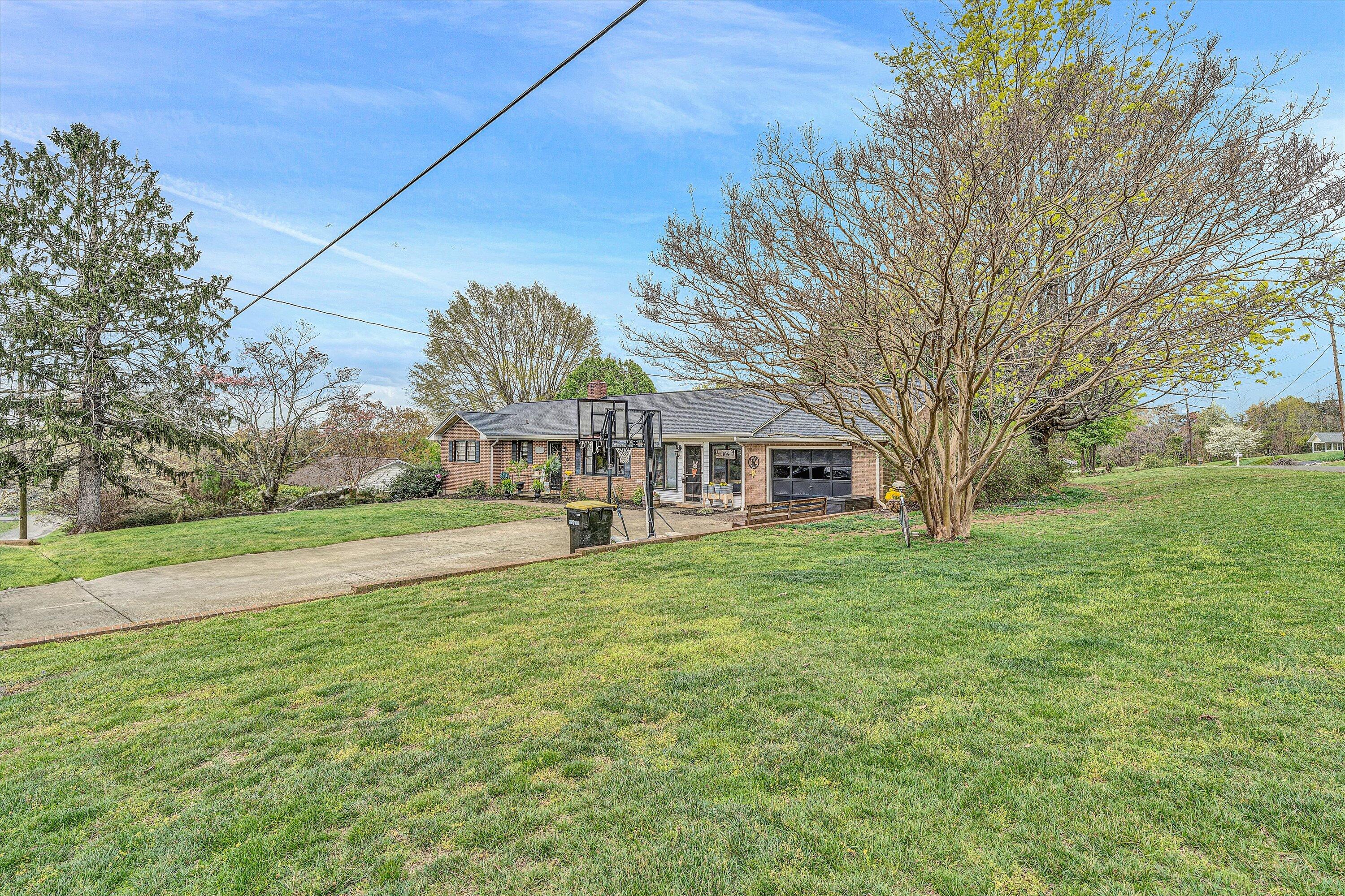 105 Cornell Road Rocky Mount, VA 24151 - Photo 26 of 34 a view of house with outdoor space and garden