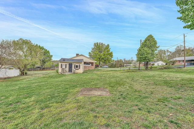a view of a park with a slide