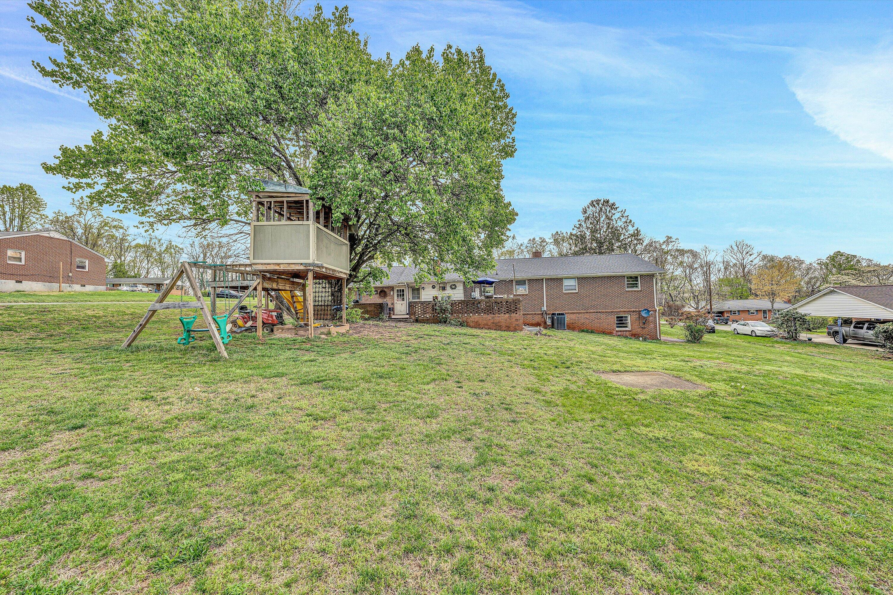 105 Cornell Road Rocky Mount, VA 24151 - Photo 32 of 34 a view of a house with a yard