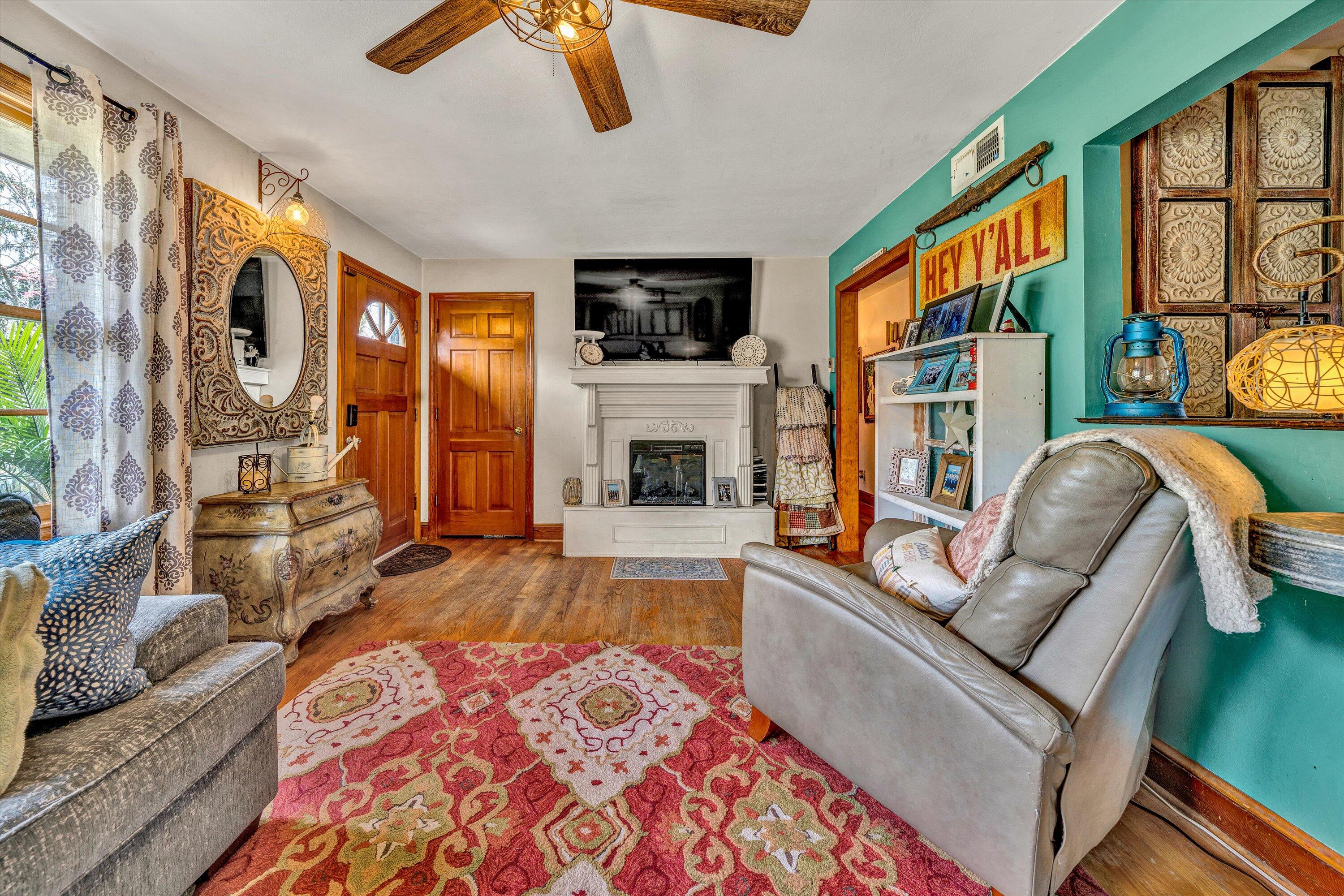 105 Cornell Road Rocky Mount, VA 24151 - Photo 6 of 34 a living room with furniture fireplace and flat screen tv