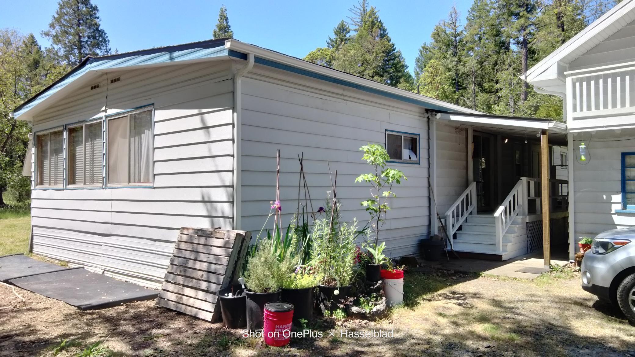 575 Kirkham Road Cave Junction, OR 97523 - Photo 6 of 45 a front view of a house