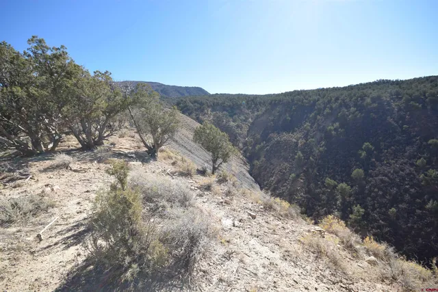a view of mountains and valleys