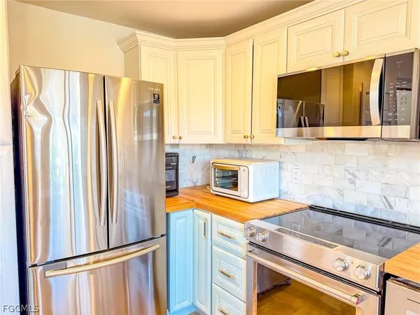 a view of sink with wooden floor