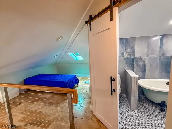 a bathroom with a sink and a shower