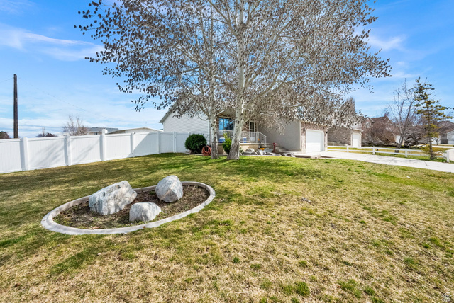 1284 North 900 West Clinton, UT 84015 - Photo 3 of 22 Fenced yard with driveway