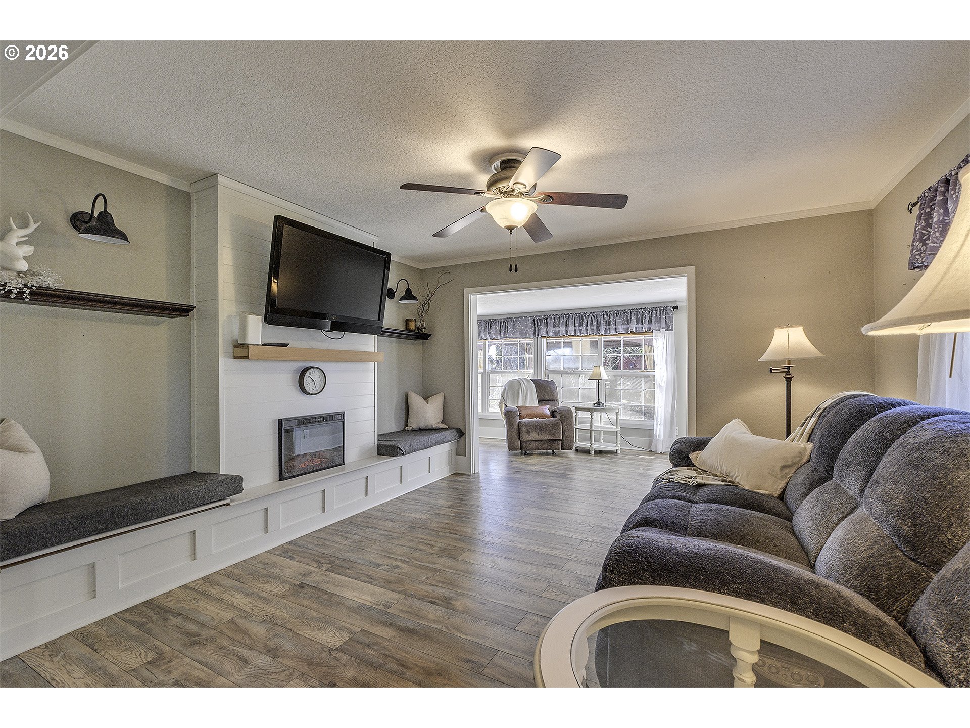 58059 Shadley Lane Warren, OR 97053 - Photo 13 of 39 a living room with furniture and a flat screen tv