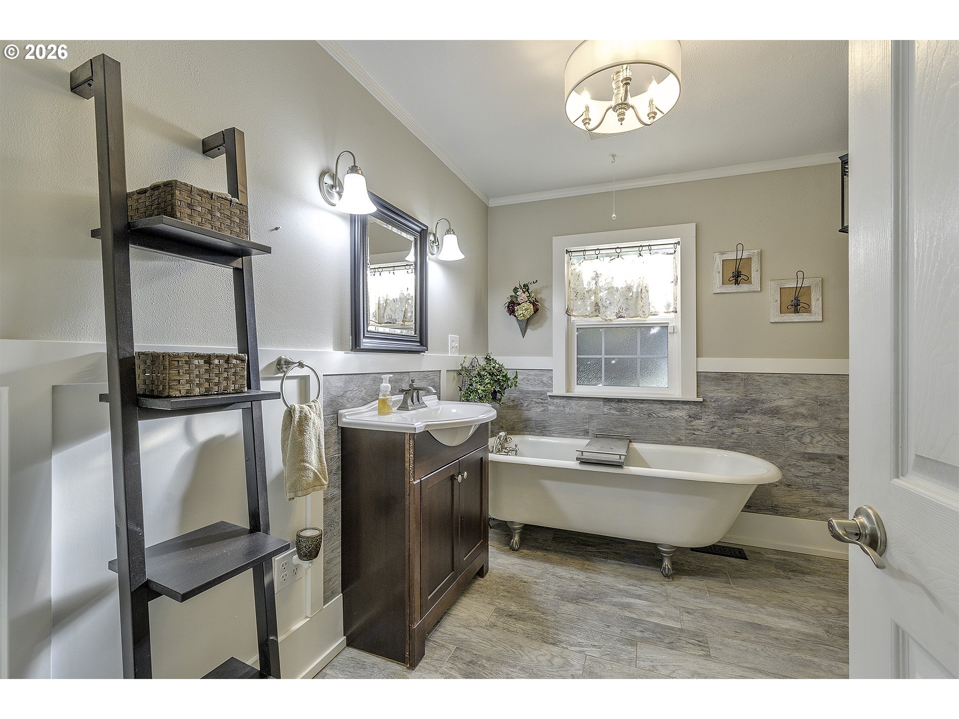 58059 Shadley Lane Warren, OR 97053 - Photo 20 of 39 a bathroom with a sink mirror and a bathtub