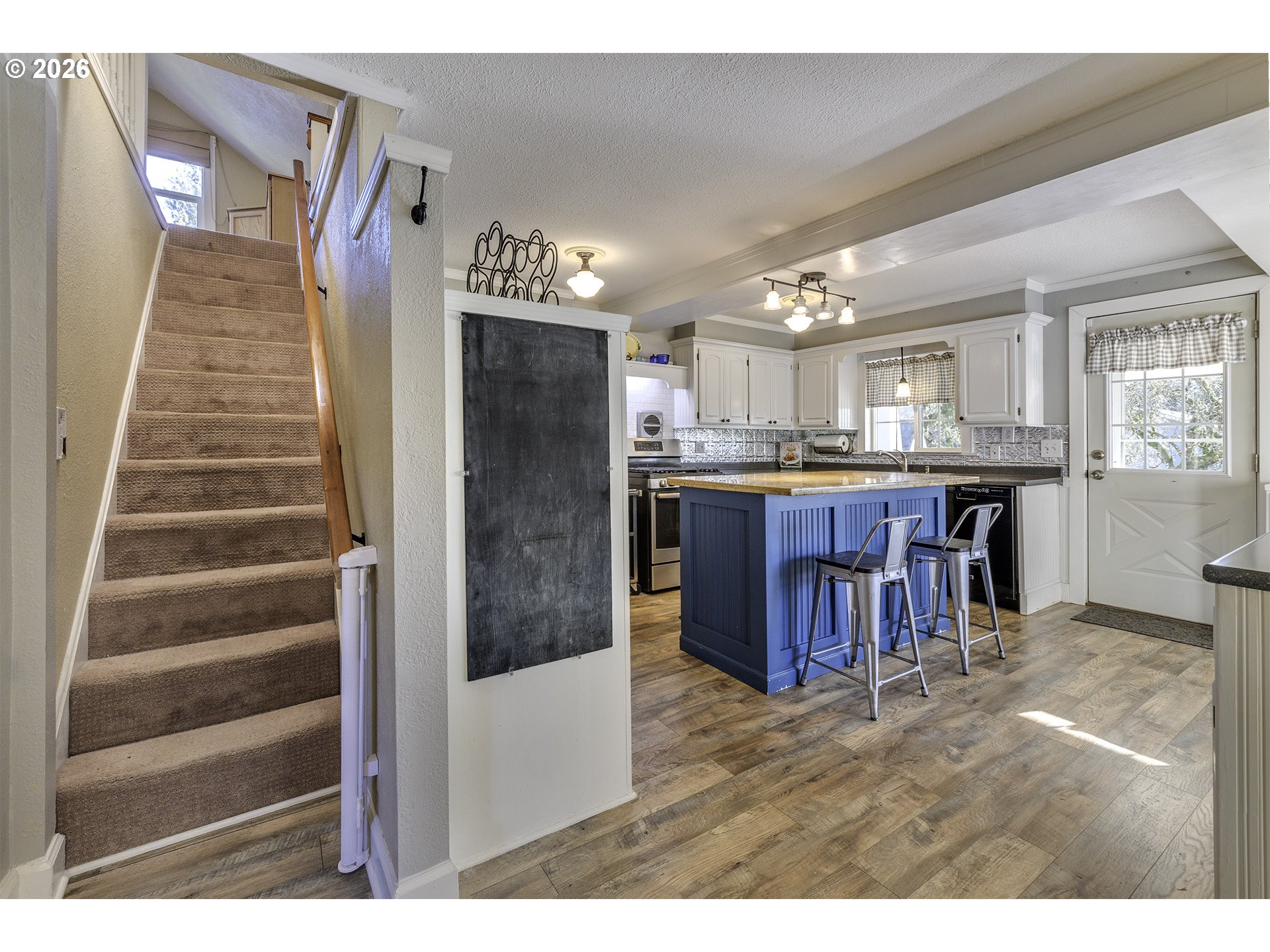 58059 Shadley Lane Warren, OR 97053 - Photo 21 of 39 a view of kitchen with furniture and chandelier