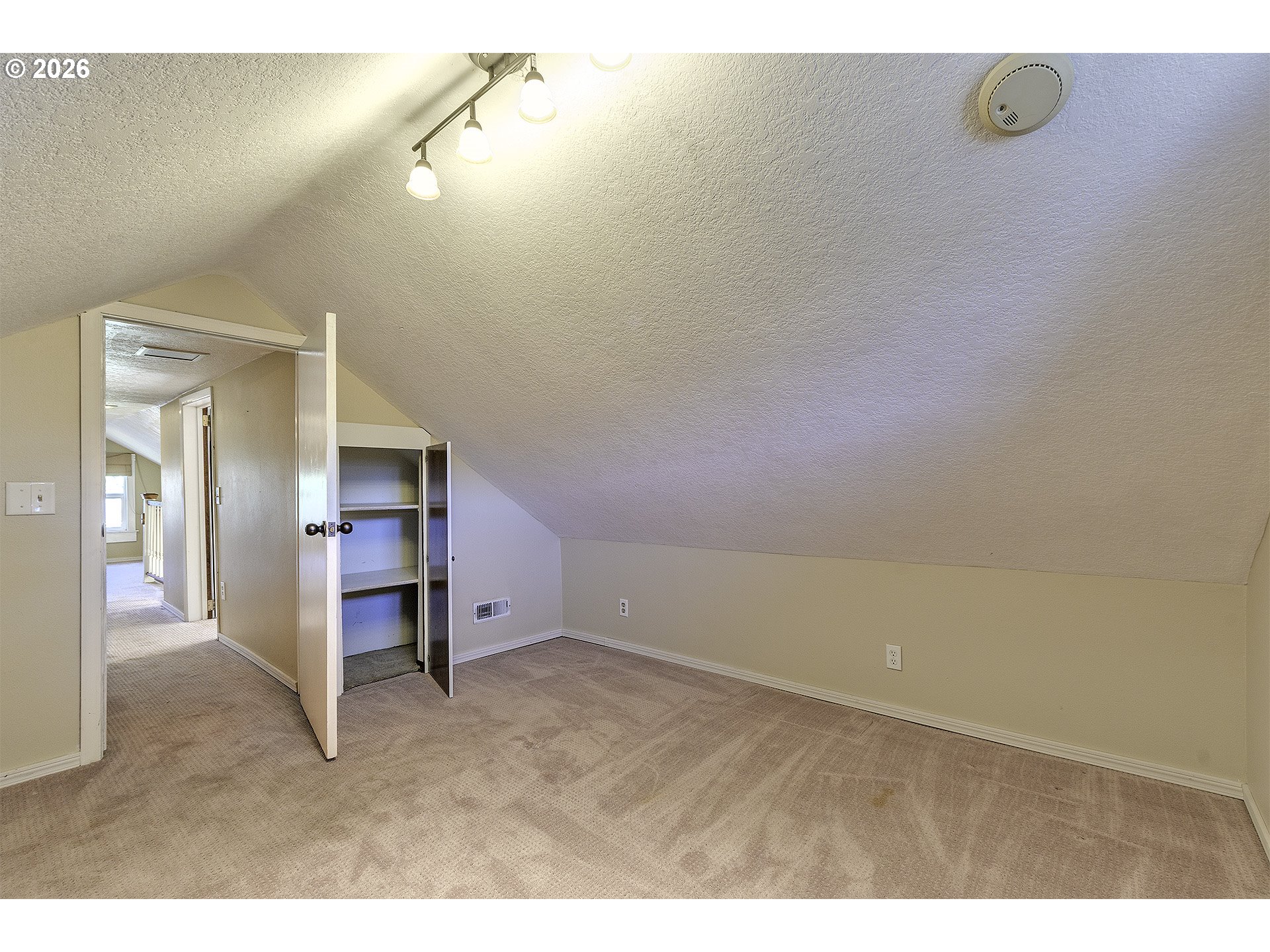 58059 Shadley Lane Warren, OR 97053 - Photo 26 of 39 a view of a room with cabinet and mirrors