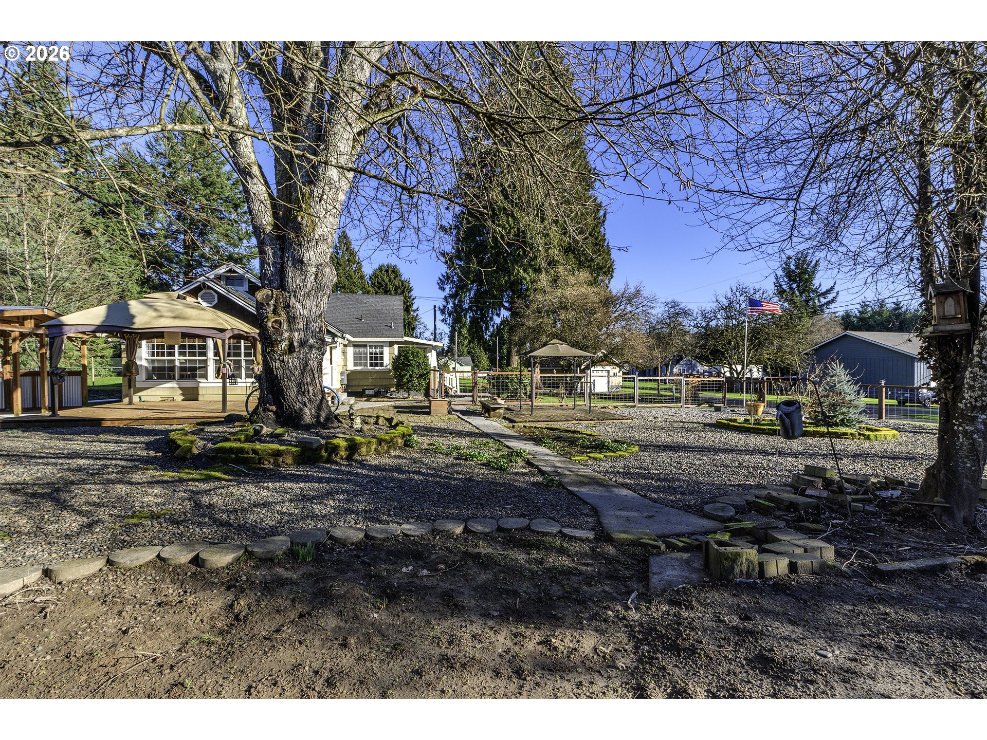 58059 Shadley Lane Warren, OR 97053 - Photo 29 of 39 a backyard of a house with lots of green space