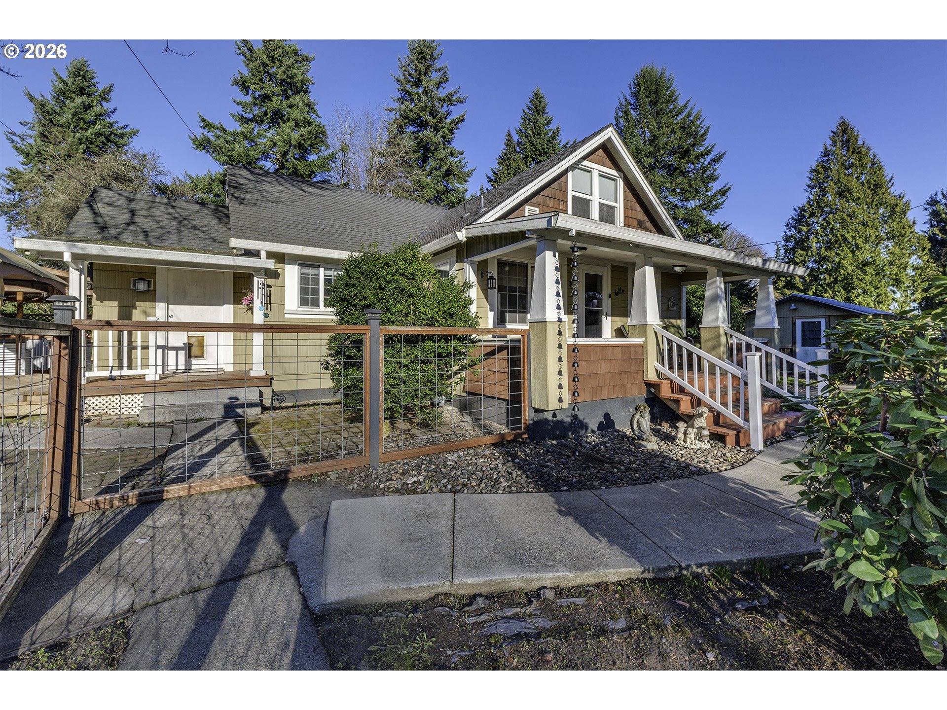 58059 Shadley Lane Warren, OR 97053 - Photo 3 of 39 a front view of a house with a yard