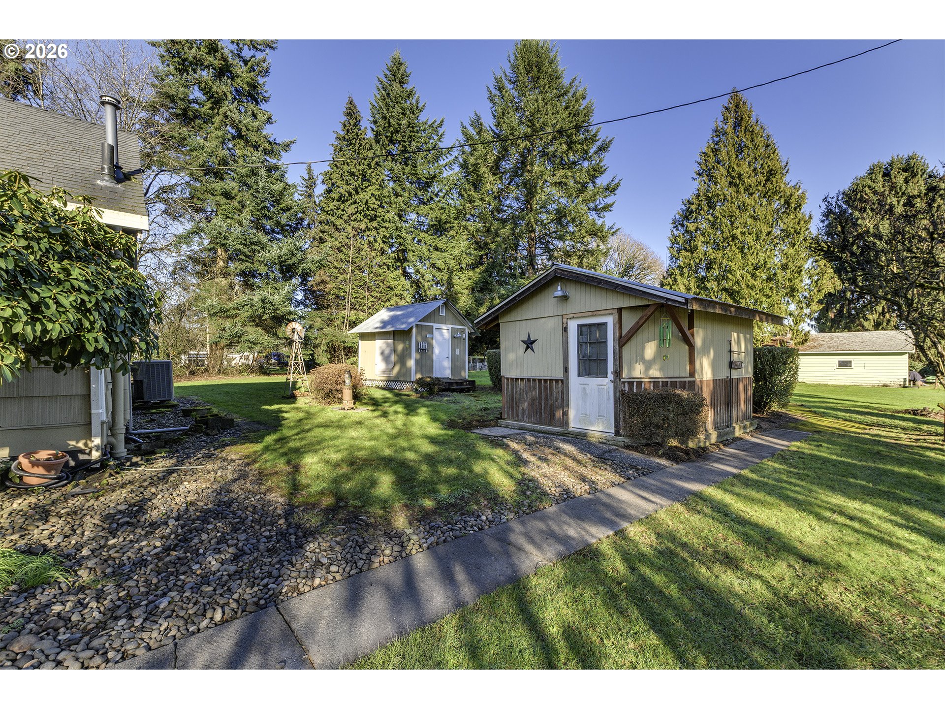 58059 Shadley Lane Warren, OR 97053 - Photo 32 of 39 a front view of a house with a yard
