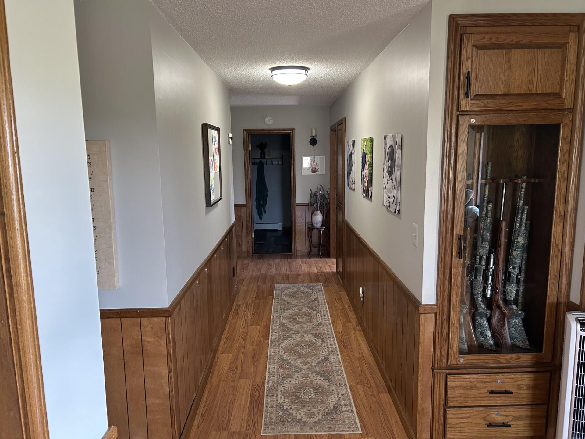 10239 Krugh Road Mendon, OH 45862 - Photo 15 of 52 Wide hallways. Built in gun safe.