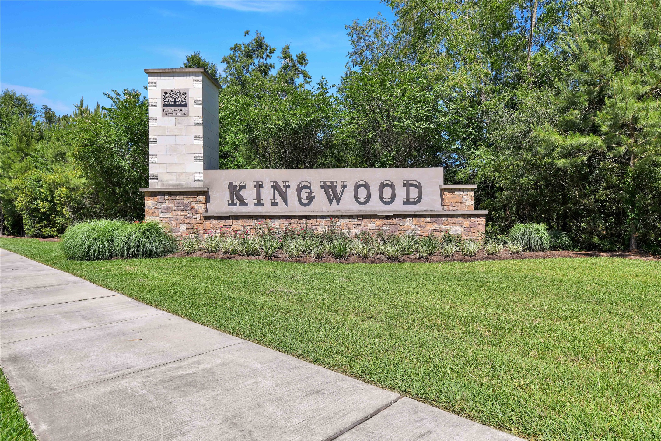 Tbd Hueni Road Porter, TX 77365 - Photo 18 of 19 a sign that is sitting on a brick wall
