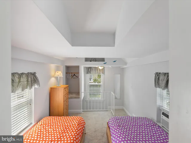 a view of a balcony with chairs