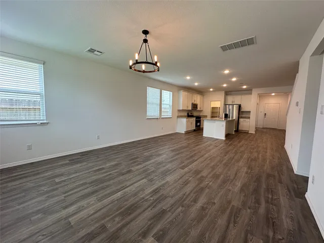 a view of kitchen and windows