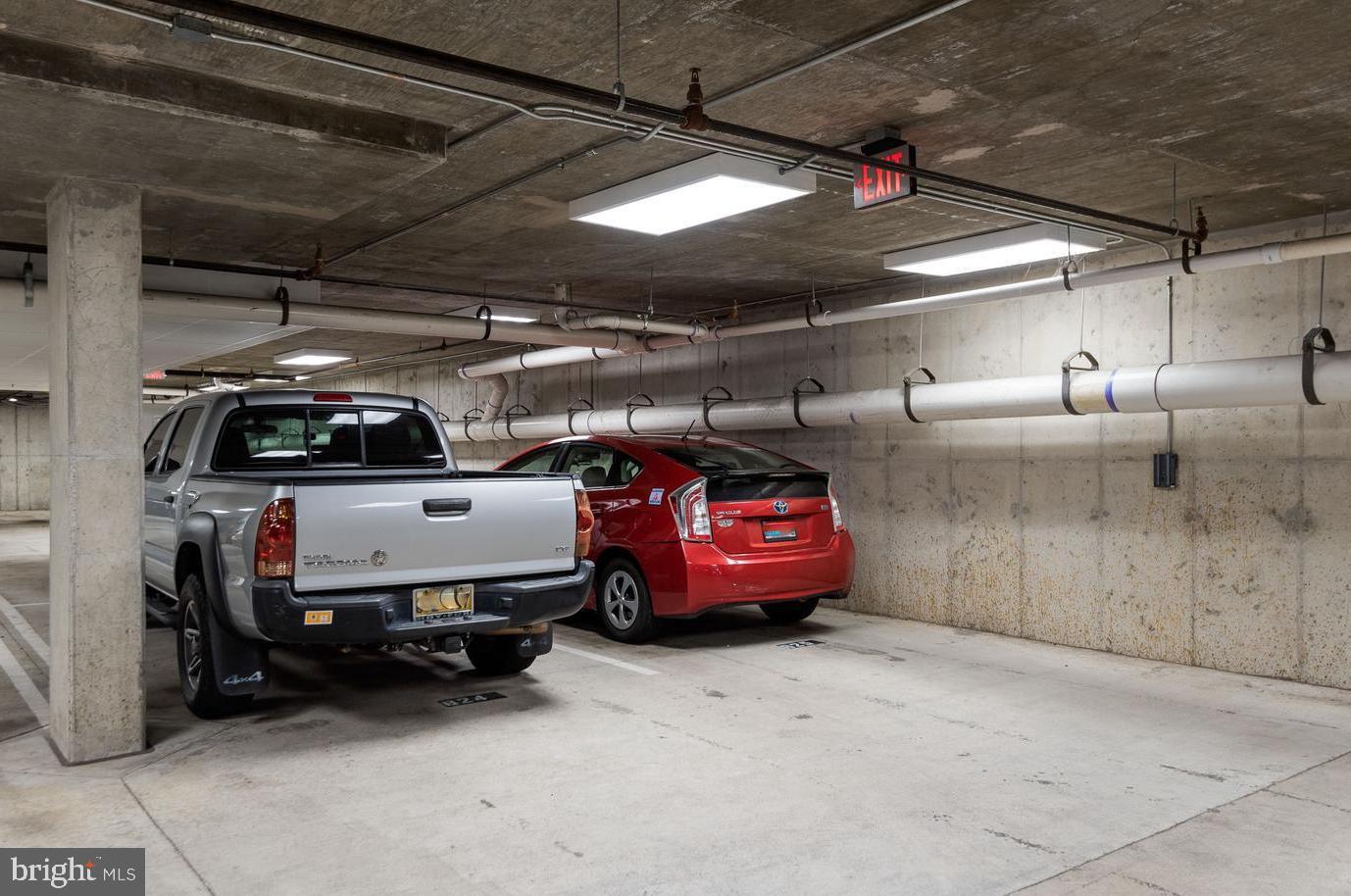1418 North Rhodes Street, Unit B426 Arlington, VA 22209 - Photo 29 of 36 2 side by side assigned garage parking spaces