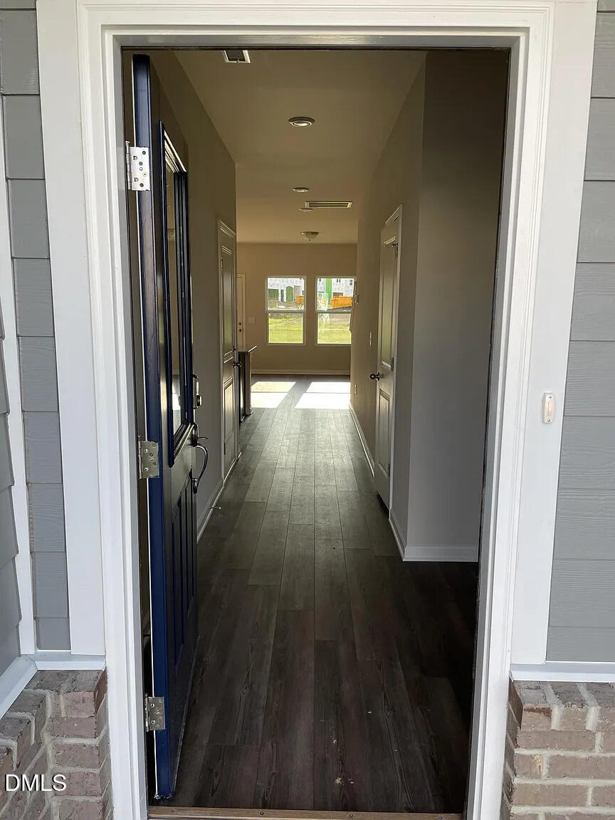 930 Field Ivy Drive Fuquay-Varina, NC 27526 - Photo 19 of 29 a view of gallery with wooden floor