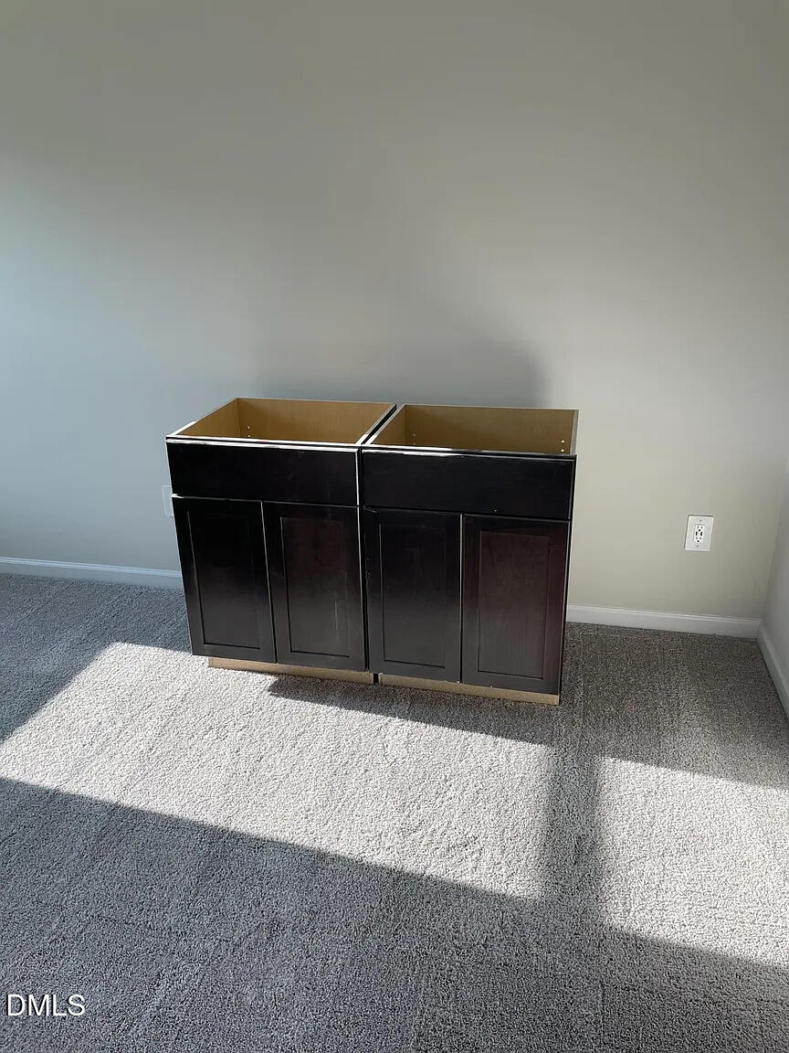 930 Field Ivy Drive Fuquay-Varina, NC 27526 - Photo 27 of 29 a car parked in front of a house