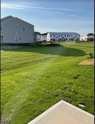 a aerial view of a house with a garden
