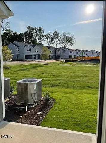 a kitchen with stainless steel appliances kitchen island granite countertop a refrigerator stove microwave and sink