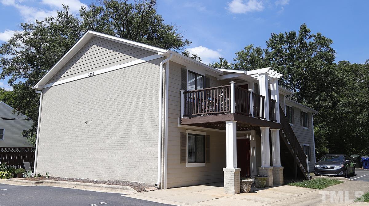 2208 Stafford Avenue, Unit 202 Raleigh, NC 27607 - Photo 1 of 15 a view of a house with yard