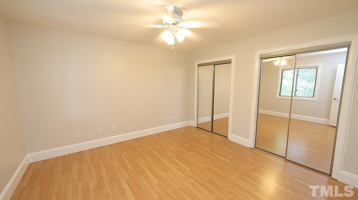 2208 Stafford Avenue, Unit 202 Raleigh, NC 27607 - Photo 11 of 15 wooden floor in an empty room