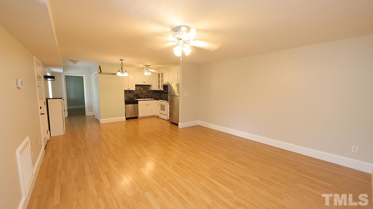 2208 Stafford Avenue, Unit 202 Raleigh, NC 27607 - Photo 6 of 15 a view of a kitchen with a sink and a refrigerator