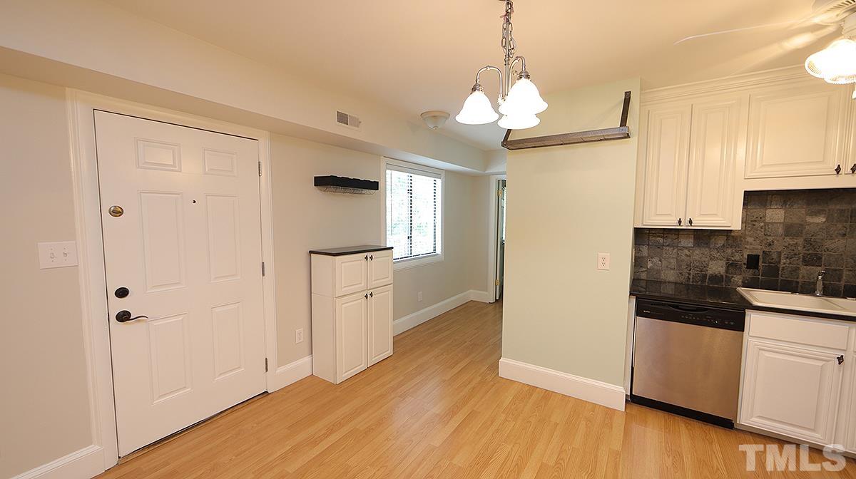2208 Stafford Avenue, Unit 202 Raleigh, NC 27607 - Photo 8 of 15 a view of a kitchen from the hallway