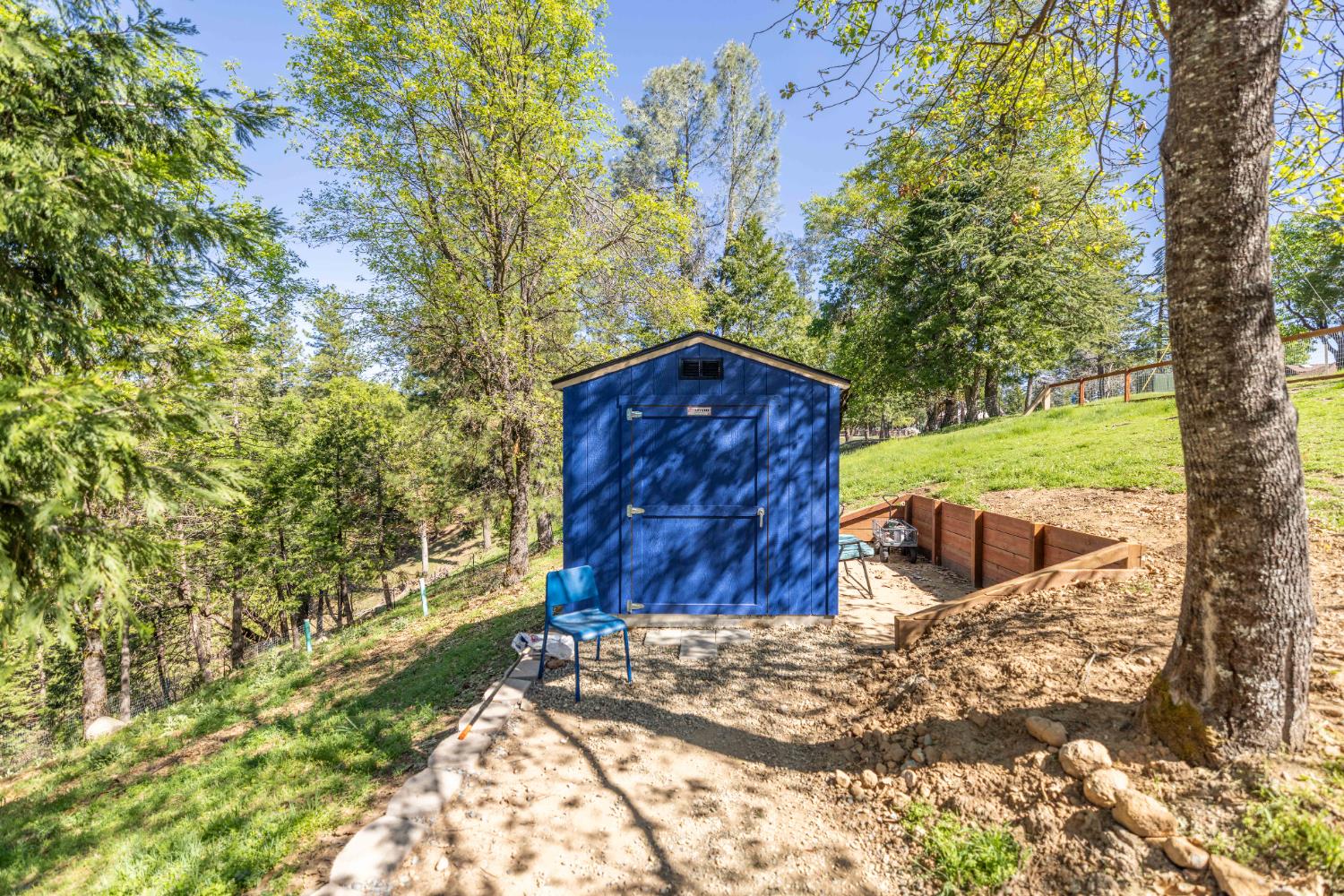5015 Shooting Star Road Pollock Pines, CA 95726 - Photo 22 of 44 a view of a backyard of the house