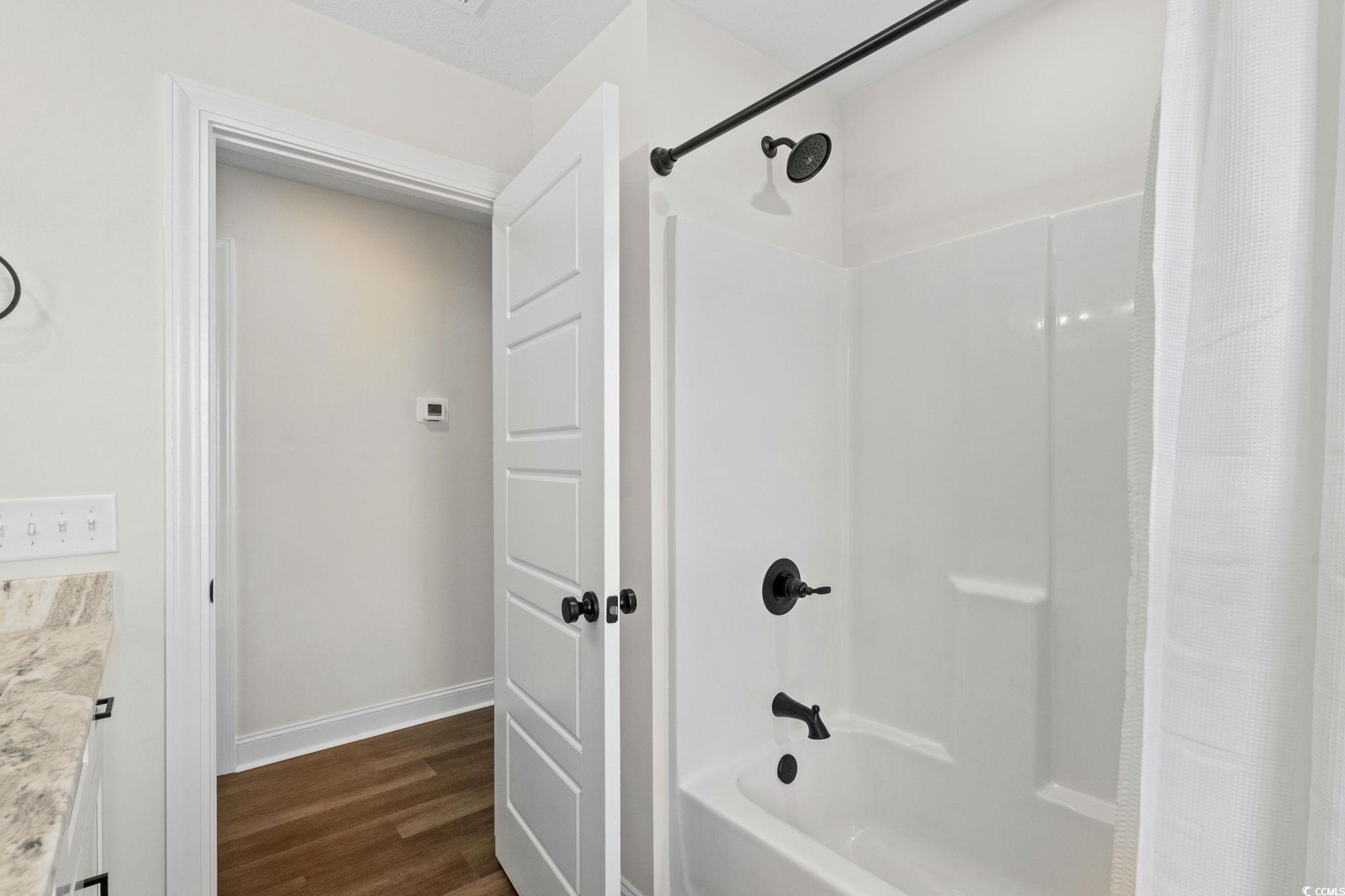 6782 Highway 366 Conway, SC 29526 - Photo 18 of 37 Walk in closet featuring dark wood-type flooring