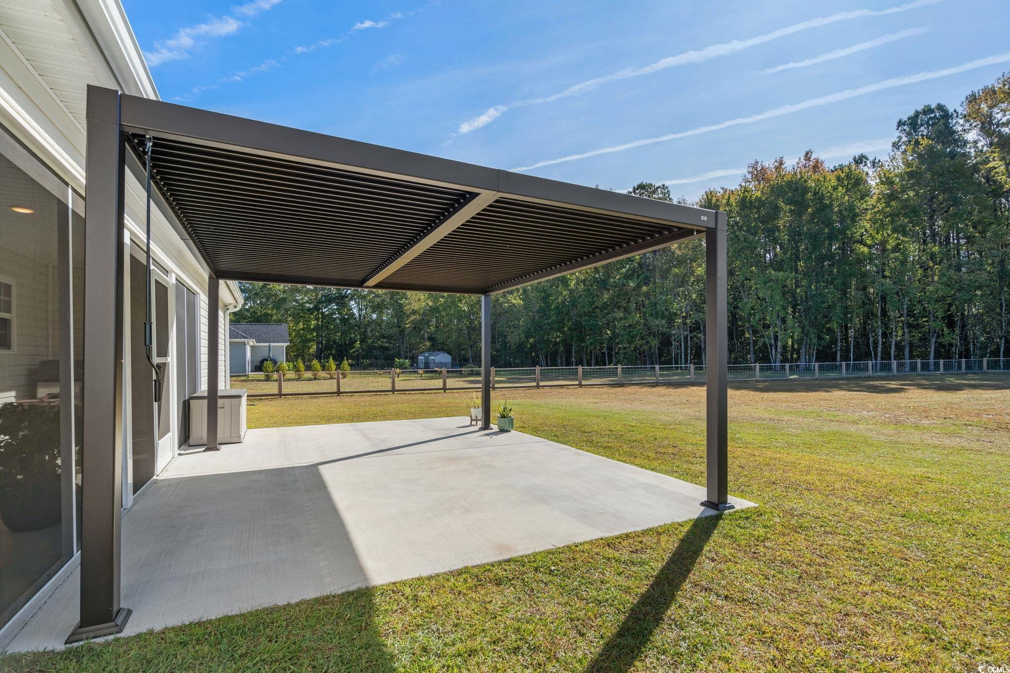 6782 Highway 366 Conway, SC 29526 - Photo 23 of 37 Laundry area with dark wood-type flooring and washing machine and dryer