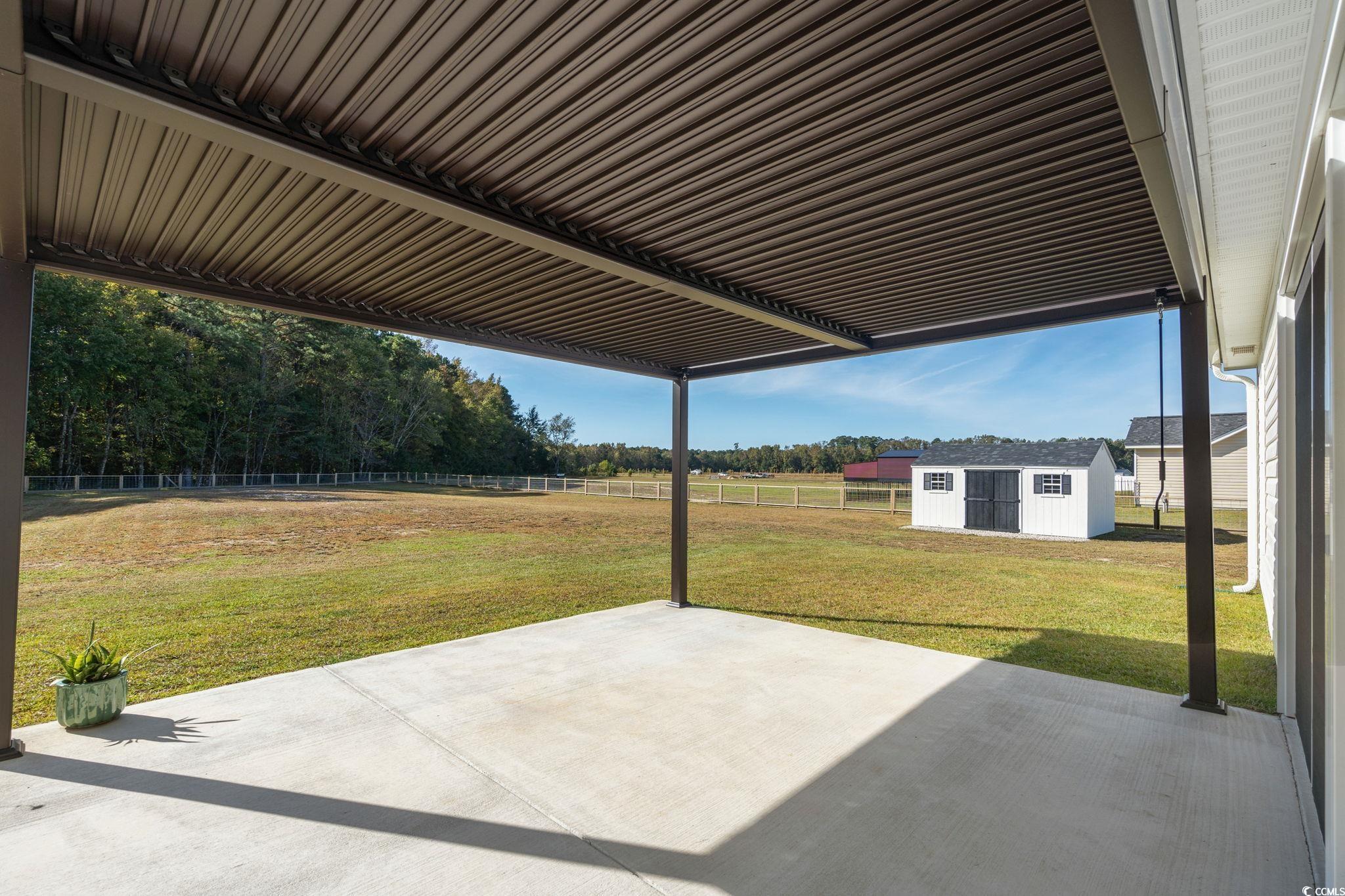 6782 Highway 366 Conway, SC 29526 - Photo 24 of 37 Unfurnished sunroom with a patio area