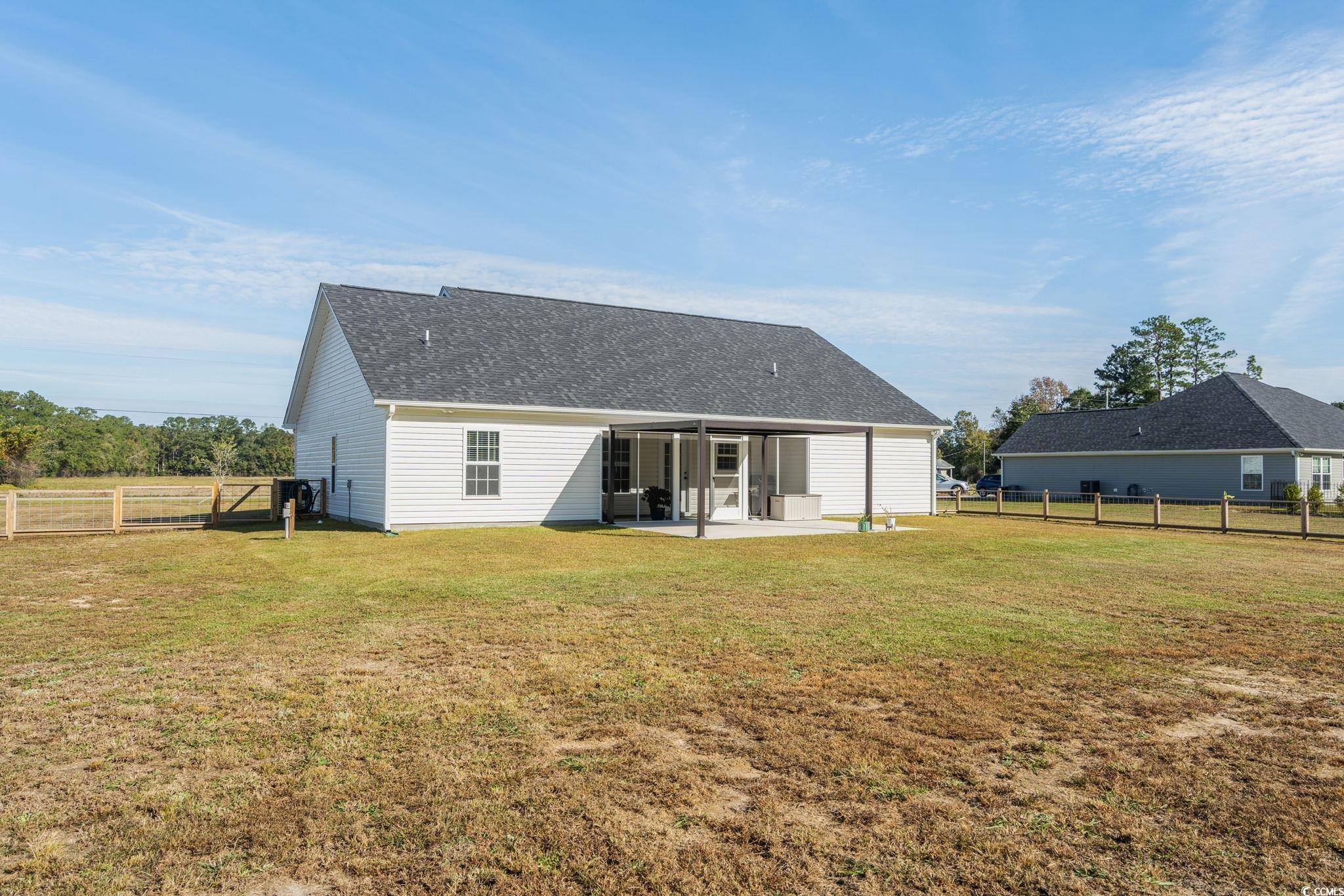 6782 Highway 366 Conway, SC 29526 - Photo 27 of 37 Fenced backyard featuring a patio and a storage shed