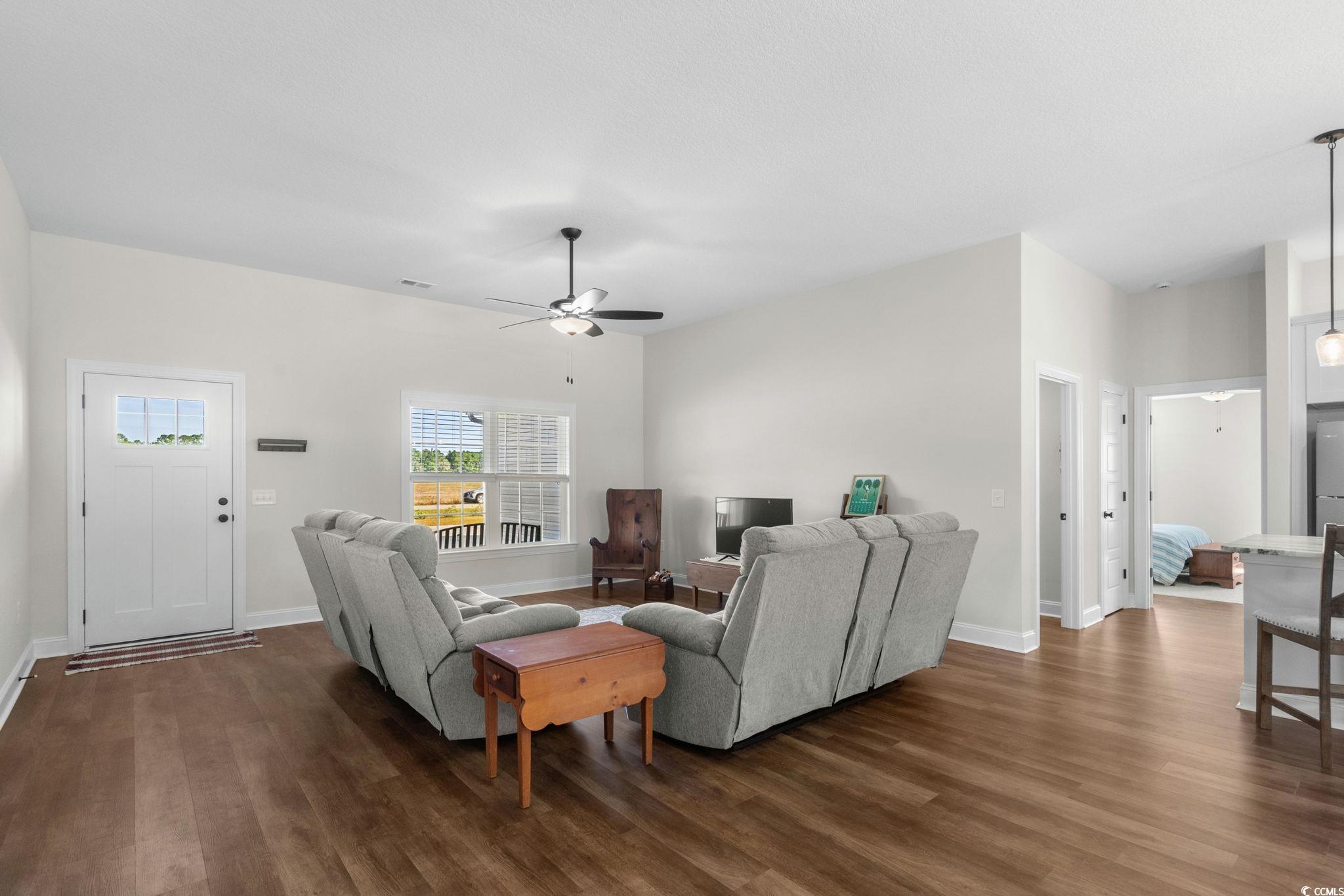 6782 Highway 366 Conway, SC 29526 - Photo 4 of 37 Living room with dark wood-style flooring and a ceiling fan