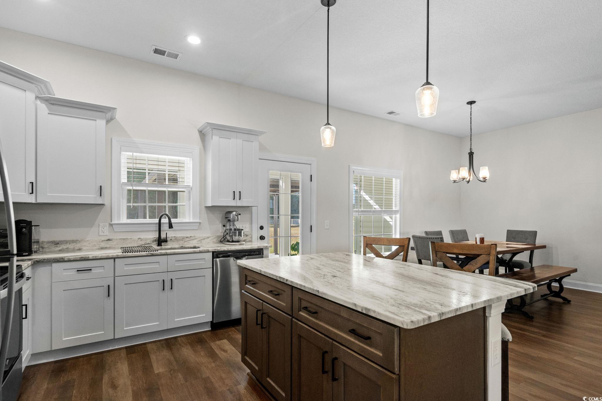 6782 Highway 366 Conway, SC 29526 - Photo 7 of 37 Kitchen with white cabinetry, dark brown cabinetry, light stone countertops, dark wood-style flooring, and recessed lighting